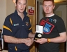 James O'Mullan was part of the successful Antrim Minor Hurling team which won the Ulster Championship; he receives a special award from the club for his participation from Kieran Mc Gourty
